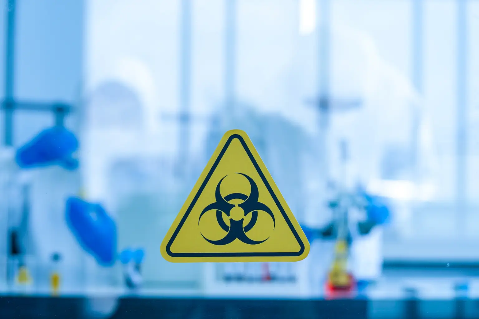 Biohazard symbol on laboratory window.
