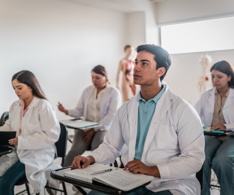 Medical students attending a classroom lecture.